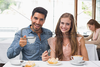 Couple having coffee at coffee shop