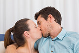 Loving young couple kissing