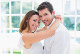 Side view portrait of loving couple at home