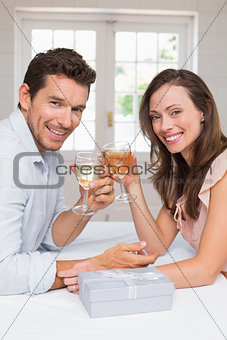 Portrait of a loving couple toasting wine glasses