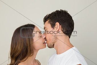 Side view of a loving couple kissing