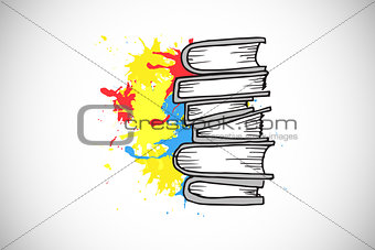 Composite image of pile of books on paint splashes