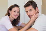 Side view portrait of loving couple at home