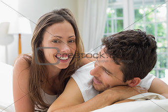 Close-up of a relaxed couple lying in bed