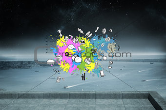 Composite image of technology and business icons on paint splashes
