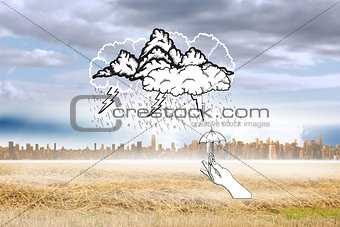 Composite image of storm doodle with hand holding tiny umbrella