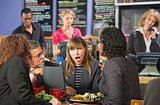 Shocked Woman in Cafe