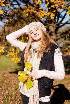 young woman in autumn sunshine outdoor