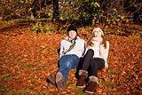 happy young couple smilin in autumn outdoor