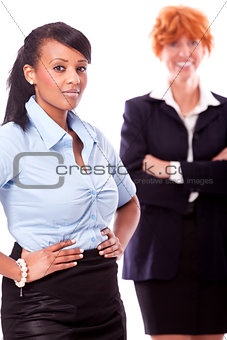 young african business woman and female team isolated
