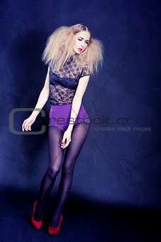 attractive blonde woman with big hair and modern styling 