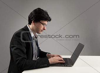 young businessman working on laptop