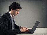 young businessman working on laptop
