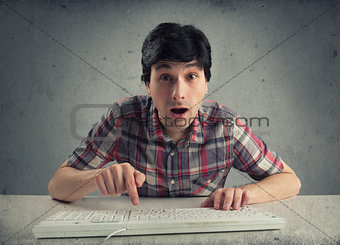 confused man with keyboard