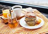 Breakfast with pancakes at the window