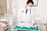 doctor examine a infant body situation 