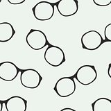 Hipster glasses seamless blue vector pattern or background.