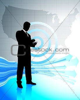 Business man with laptop on United States map