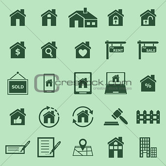 Real estate color icons on green background