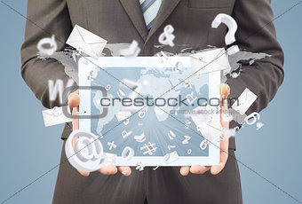 Man in suit holding tablet pc. Mailing concept