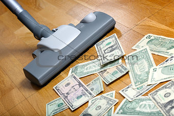 Vacuum cleaner sucks on U.S. dollars