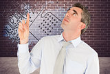 Composite image of business manager pointing