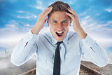 Composite image of stressed businessman shouting