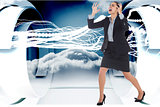 Composite image of angry businesswoman gesturing