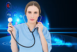 Composite image of young woman doctor holding a stethoscope