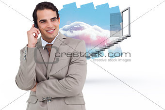 Composite image of smiling salesman on his cellphone