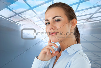 Composite image of side view of thinking young businesswoman