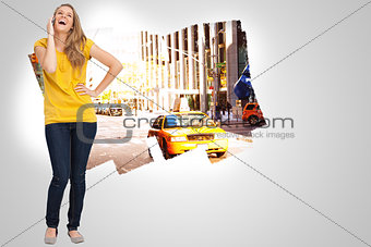 Composite image of beautiful blonde woman laughing on the phone