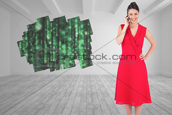 Composite image of cheerful elegant brunette in red dress on the phone posing