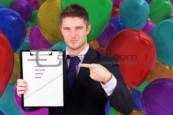 Composite image of businessman with customer service report