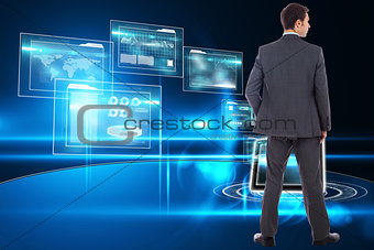 Composite image of serious businessman with hand in pocket