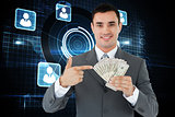 Composite image of businessman pointing at bank notes in his hand