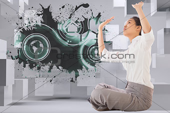 Composite image of businesswoman sitting cross legged pushing up