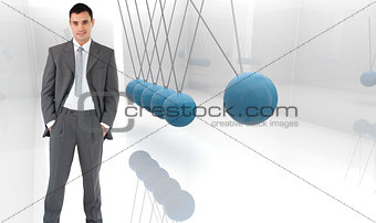 Composite image of businessman with his hands in his pockets