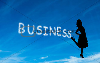 Composite image of business written in white in sky
