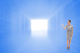 Composite image of woman in a dress holding her hand up