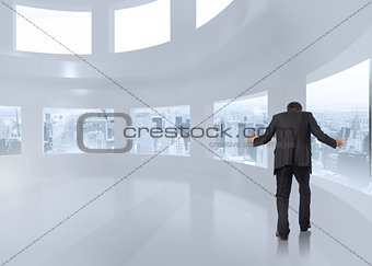 Composite image of gesturing businessman