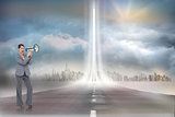 Composite image of businesswoman with loudspeaker