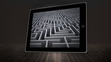 Composite image of maze on tablet screen