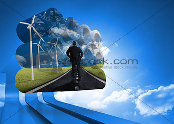 Composite image of businessman on road on abstract screen
