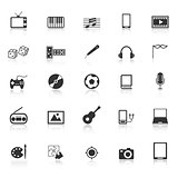 Entertainment icons with reflect on white background