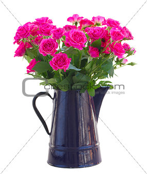 bouquet of blossoming pink roses in vase