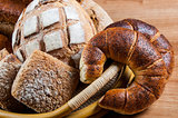Group of different breads type on wooden table