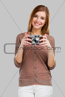 Woman with a old camera