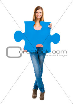 Woman holding a puzzle