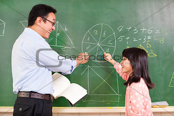 Teacher and student discussing math questions